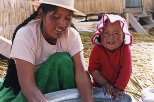 Helping Mum, Lake Titicaca, Peru