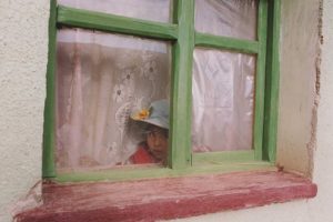 Girl in window, Bolivia